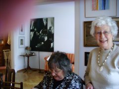 Rona and Pat in the art gallery that is their home