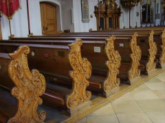 Beautifully carved pews in the church